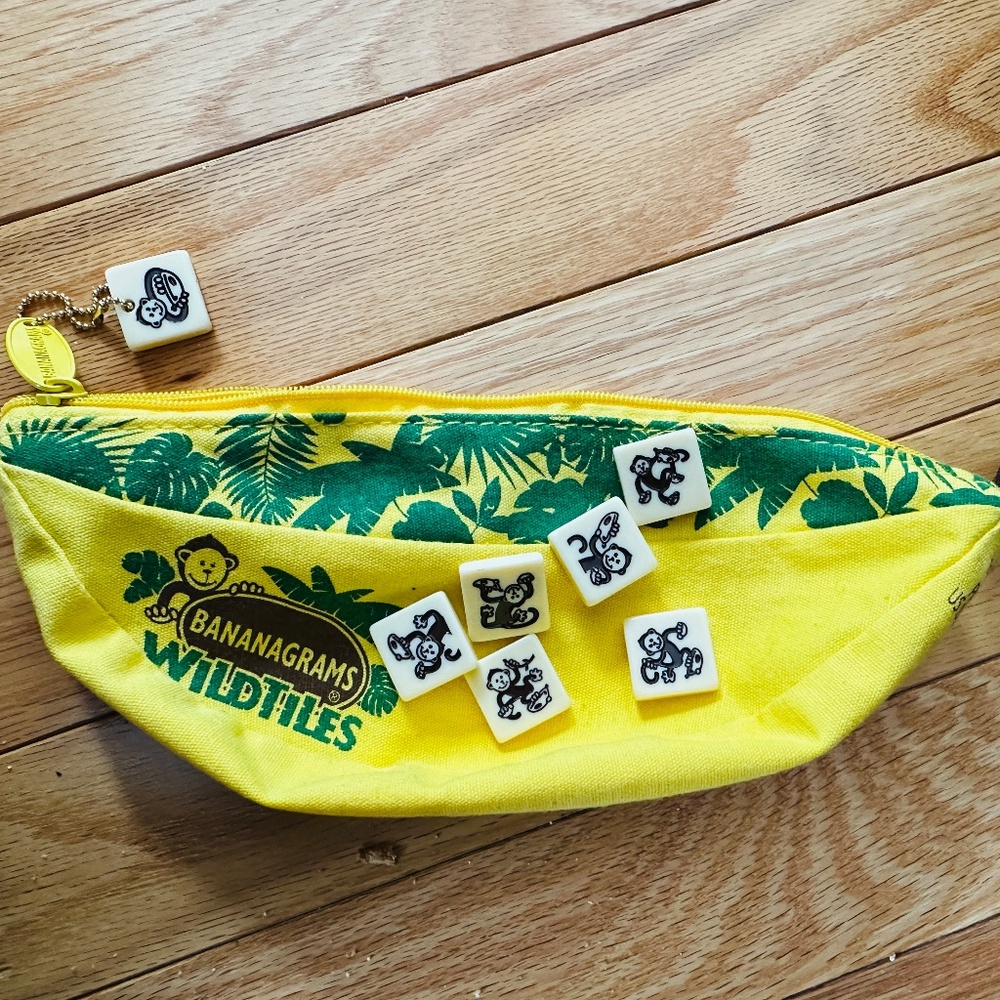 Bananagrams Wild Tiles Word Game Set with Yellow Banana Shaped Pouch